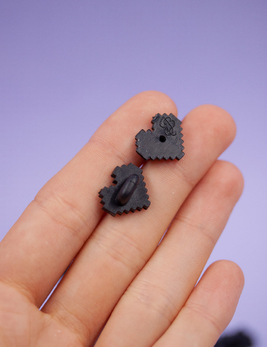 BLACK PIXEL HEART Shaped rubber pin backs!
