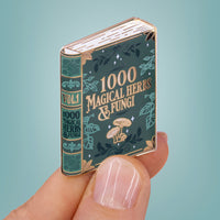 1000 magical herbs & fungi book enamel pin