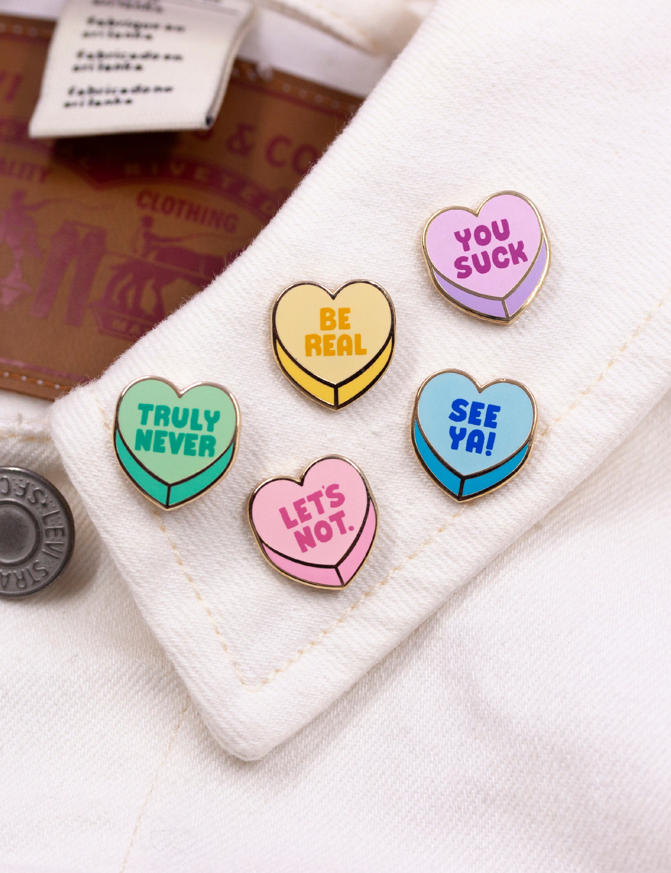 Anti-Valentine heart pins